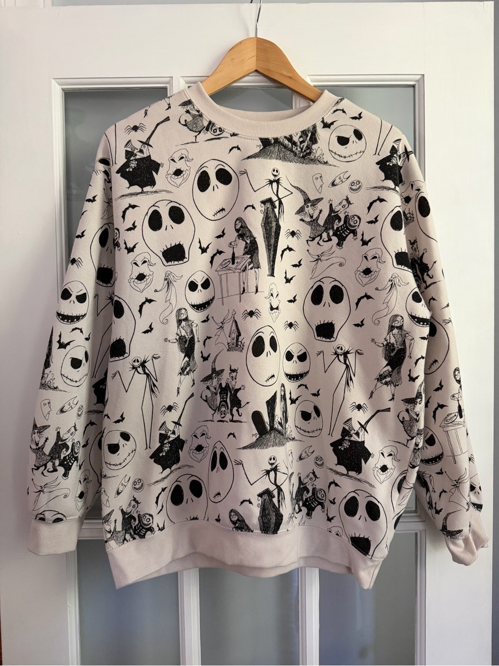 Disney Cream Sweatshirt with Black Nightmare Before Christmas Characters